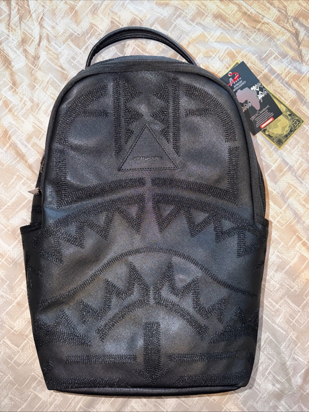 Sprayground Black Embossed African Intelligence Backpack